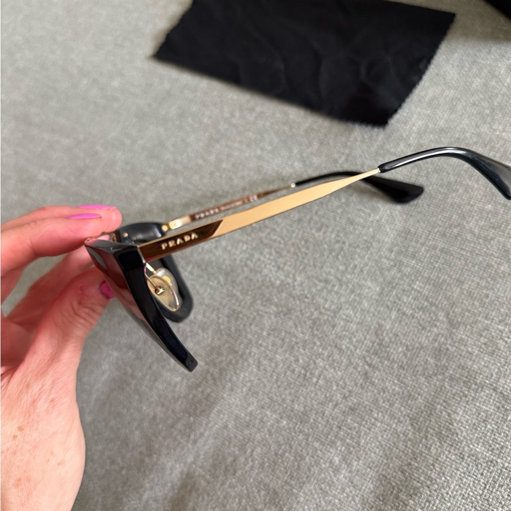 Prada Women's Sunglasses in Black with Gold Detail - Picture 3 of 6